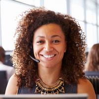 A financial aid expert helping a student with a question about loans over the phone